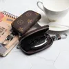مصمم الرجال Universal Car Key Case Case Usisex Male Geniine Leather Key's Holder Women Zipper Smart Keychain Cases Cars Keys Pouch Bacts
