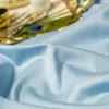 Zestawy pościeli długoterminowe bawełniane haft haft zwykły czteroczęściowy łóżko pościel cztery pory roku uniwersalny luksusowy styl pawi niebieski zielony