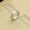 202318K Gold Bolted Luxury Crystal Wedding Ring Eternal Love Men and Women Wedding Ring Designer de alta qualidade Anel de aço inoxidável