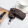 مصمم الرجال Universal Car Key Case Case Usisex Male Geniine Leather Key's Holder Women Zipper Smart Keychain Cases Cars Keys Pouch Bacts