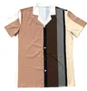 Moda Uomo T-shirt Designer T-shirt T-shirt Abbigliamento Top Camicia a righe casual da uomo Abbigliamento di lusso Polo Abbigliamento manica Camicetta scozzese