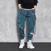 Pantalones de hombre moda Streetwear hombres reflectante Hip Hop pantalones Cargo sueltos Joggers masculinos cinta hombres Harem pantalones MaleTrousers 230316