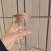 カリフォルニア州カリフォルニア州の堆積ガラスカップの蓋とストローの再利用可能なコークスカップジュースビールのためのコークカップ缶コールド醸造コーヒーバーグラスカップsep04