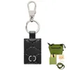 Mode porte-clés de luxe designer porte-clés lanières hommes boucle en métal porte-clés lettre imprimé en cuir voiture porte-clés sac porte-clés accessoires