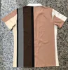Moda Uomo T-shirt Designer T-shirt T-shirt Abbigliamento Top Camicia a righe casual da uomo Abbigliamento di lusso Polo Abbigliamento manica Camicetta scozzese