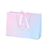 Presente, bolsa de papel de presente cor azul rosa com fita kraft de papel para roupas para armazenamento de casamento convidado presente embalagem 230316