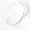 Bangle 1pc unisex stretchy elastisk metallhylsa strumpor mens elastiska armbandskjorta hållare