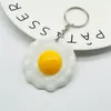 Prix de gros Simulation Oeuf Porte-clés Pendentif Résine Oeuf Frit Creative Alimentaire Porte-clés Sac De Voiture Porte-clés Bijoux Cadeau Accessoires