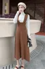 Women's turtleneck sweater and knitted spaghetti strap suspender a-line midi long dress