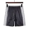 Shorts masculinos Designer de verão Fashion Loose Fit Swimwear Vestido de rua feminino Quick Difrawear Letter Print Beach Pants Men's Swimwear M-3xl#6688