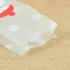 Cadeau cadeau 25 / 50pcs mignon bonhomme de neige cadeaux en plastique sacs bonbons biscuits cuisson sac d'emballage année de Noël faveurs d'hiver
