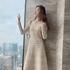 Casual jurken vintage knop gebreide trui jurk elegante Koreaanse avond lange mouw sexy v-neck plaid maxi voor vrouwen feest herfst 2023