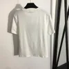 305 XL 2023 Stil Kvinnor Tvåbitar byxor Spring Summer White Black varumärke samma stil Två stycken Set kort kjol Empire Crew Neck Meiyi8