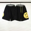 Heren shorts meichao gaojie bibo dames hetzelfde lachende gezicht printbroek paar hiphop losse sport t230317