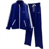 Designer de pantalons deux pièces pour femmes 2023 printemps et automne nouveau manteau uniforme scolaire bleu unisexe lettre brodée ensemble de vêtements de sport 1HOX