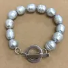 Strand Nature Freshwater Pearl Armband Fashion. NICE CLASP Big Drop Shape Grey Color