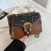 Großhandel Damen Umhängetaschen 2 Stile Flip Briefdruck Kettentasche süße Pailletten Europäische und amerikanische beliebte Handy-Geldbörse Krokodil Retro-Handtasche