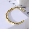 Браслеты с заброшенным золотом для женщин для женщин гладкие изогнутые металлические браслеты из бамбука на руке 2023 Модные роскошные украшения подарки