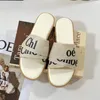 Zomerontwerper slippers nieuwe geweven dames sandalen mode luxe platform schoenen sexy outdoor strandschoenen niet-slip slijtage slijtage platte schoenen klassieke top casual schoenen