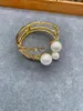 Bangle European och American Creative Designers Heavy Industry Large Pearl Copper Micro-inmatad Zircon Collar Armband