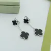 Pendientes de trébol de cuatro hojas de moda Pendientes de tornillo clásicos de lujo Pendientes de botón de amor Diseñador de mujer de moda Joyas rojas Pendientes de aro