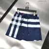 Menshorts kvinnor randiga shorts är elegant simma korta casual sportstrand byxor svartvitt