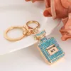 Fashion Design Key Ring Perfume Bottle Keychains Holder for Women Creative Crystal Rhinestone Diamond Metal Car Keyring Chain Bag Pendant Gift Good