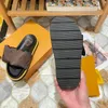 Hoogwaardige modepantoffels Damesontwerpers Sandalen Sunset Flat Comfort Muilezels Gevoerde pantoffels met band aan de voorkant Modieuze stijl Slippers maat 35-44 heren damesschoenen