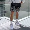 Män rhude shorts sommardesigner street alfabetet tryck utdragande avslappnade sport shorts strandbyxor capris män kvinnor lös shorts