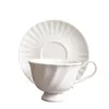 Muggar Europeiska kaffekoppen och fatet Set Pure White Simple Bone China Ceramic Flower Cups Cute