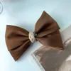 Mody dwupaliwowe Bowknot Ribbon Solidny kolor spinki do włosów Kobieta Dziewczyna Satyna Barrette Bow Back Głowa Sprężyna