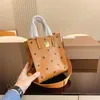 Bolsa de ombro de corpo cruzado de luxo mulheres alça de couro bolsas mens viagens de fim de semana Designer de luxo mini tote mc mesmo bsags embreagem hobo pochette bolsas