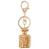 Porte-clés longes design de mode porte-clés bouteille de parfum porte-clés pour femmes créatif cristal strass diamant métal voiture porte-clés chaîne sac pendentif cadeau g