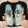 Tofflor strand flip flops kvinnor thong sandaler sommar gelé skor flickor transparent glider solid mode pvc platt non-halp tofflor z0317