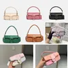 디자이너 C 's Pillows Tabby Shoulder Bag 고품질 여성 순수한 컬러 Bacchus Bags 레트로 하드웨어 흐린 핸드백 만찬 소프트 리얼 가죽 바게트