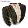 wangcai01 Pantalons pour hommes Mode japonaise pour hommes chaud sarouel en laine d'agneau taille de rue pantalon de Jogging épaissi décontracté pantalon de sommeil à la maison 0318H23