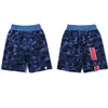 Designer de tubarão Bathing Ape mass shorts masculinos algodão feminino de triturador de tubarão da cabeça da cabeça da cabeça de camuflagem Borno