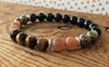 Filo Chakra del plesso solare 8MM Perlina Onice nero Occhio di tigre Pietra Pirite Sole Bracciale Manipura Gioielli Yoga Mala