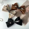 Mody dwupaliwowe Bowknot Ribbon Solidny kolor spinki do włosów Kobieta Dziewczyna Satyna Barrette Bow Back Głowa Sprężyna