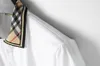 مصمم أزياء الرجال الفاخرة حجم كبير الراقي بولو قميص النسخة الكورية من الاتجاه المطرزة نصف كم جديد طية صدر السترة الرجال قصيرة الأكمام