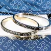 Kobiety miłośnicy mankiet bransoletka czarne bransoletki luksus designer podwójny liter g biżuterii Tytanium stalowe mody