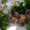 装飾的な花2pcs人工植物松の枝クリスマスツリーアクセサリーdiy yearパーティーデコレーションウェディングオーナメントキッズギフト