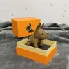 رسائل مصممة العلامة التجارية الكرتون حيوان صغير الكلب الإبداعي سلسلة مفتاح الخاتم PU LEATHER LEATHER PORTOD
