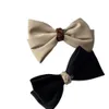 Mody dwupaliwowe Bowknot Ribbon Solidny kolor spinki do włosów Kobieta Dziewczyna Satyna Barrette Bow Back Głowa Sprężyna