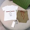 23ss designermärke baby T-shirt shorts kostym pojkar flickor samma stil klassisk logotyp tryck Kort ärm Enfärgad stickade shorts set Babykläder a1