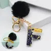 Keychains 1 stc 26 Engelse letter Key Chain Bag Pendant accessoires Bont Ball Keychain Car Decor Fashion Sieraden Geschenk Acryl Soft Fluffy Miri2