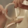 Länkarmbandkedja sötvatten pärla till hands mode enkel magnet spänne temperament och personlighet för kvinnor
