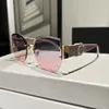 豪華なファッションデザイナーOval Frameless Sunglasses for Women UV Protection Vintage Cat Eye Frame Eyewear with Box and Packag3993654