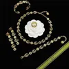 2023 Designer New Gujia/Gjia new turquoise necklace double G small daisy earring ring open bracelet