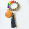 Foreign trade beaded bracelet key chain personalized creativity silicone rainbow bracelet PU leather tassel key ring